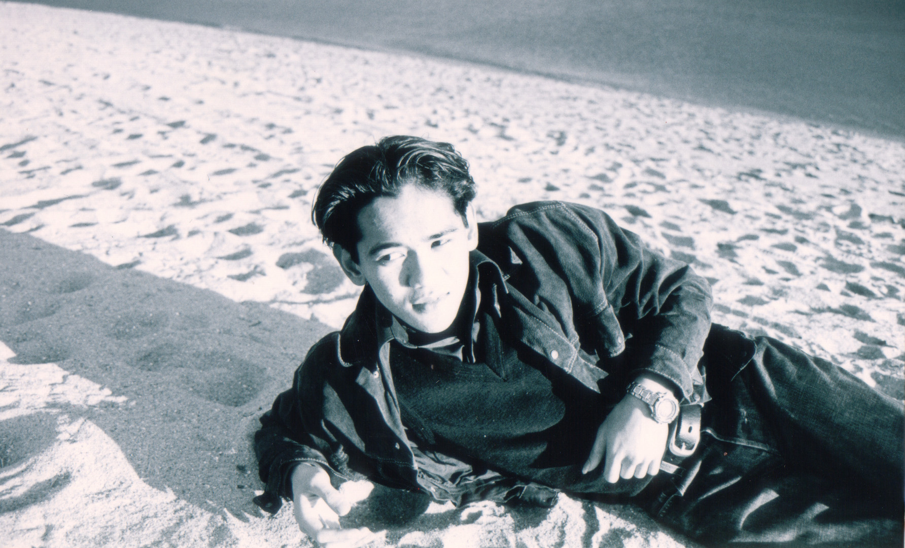 Marquez at the beach around the period when The First Chapter songs were recorded.